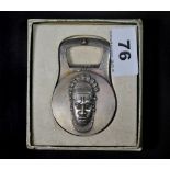 A rare French silver plated bottle opener stamped Christofle France Coll. Gallia decorated with an