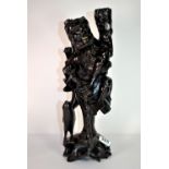 A mid 20th century Chinese carved hardwood figure, H. 40cm.