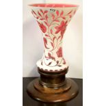 An unusual wooden mounted large 19th century Bohemian cut glass vase, H. 49cm.