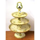 An Italian Meiselman hand painted pottery cake stand. H. 42cm.