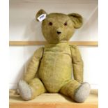 A large antique articulated teddy bear, L. 59cm.
