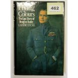 A hardback copy of "Flying colours. The epic story of Douglas Bader" signed by the author Laddie