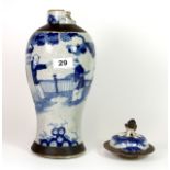 A 19th century Chinese hand painted and crackle glazed vase and lid, A/F to vase rim and repair to