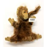 A vintage monkey hand puppet, H. 22cm.