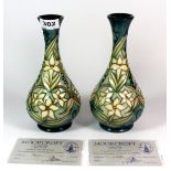 A pair of Moorcroft limited edition Carousel vases designed by Rachel Bishop, H. 23cm. No 964 &