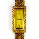 A lady's vintage 9ct gold Bueche Girod wrist watch with integral strap, approx 23.7g.