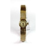 Lady's 9ct gold vintage Rolex mechanical wristwatch with integral strap.