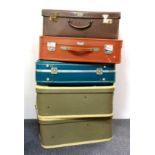 Five vintage suitcases