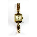 A lady's vintage 9ct gold Omega cocktail watch on a gold plated strap with two extra links.