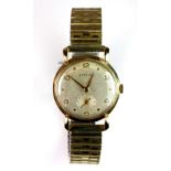 Gent's vintage 9ct gold cased Garrard wristwatch on an expandable gold plated strap.