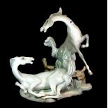 A large Lladro porcelain figurine of two horses, H. 40cm, (A/F to one leg).