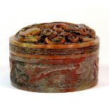 A Chinese carved soapstone ink box, signed to base, Dia. 9.5cm, H. 7cm.