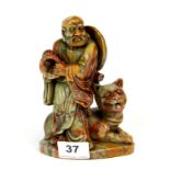 A fine Chinese hand carved hardstone figure of a Deity with a tiger, H. 17cm.