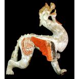 A Chinese painted terracotta dragon tomb guardian, H. 39cm, (restoration to legs) understood to be