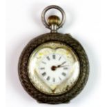 A pretty Edwardian hallmarked silver fob watch with heart shaped dial cover.