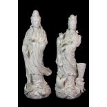 Two Chinese blanc de chine porcelain figures of the Goddess Guanyin, H. 31cm.