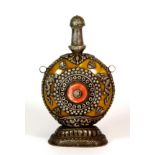 A Tibetan silvered copper table snuff bottle, H. 18cm.