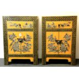 A pair of hand painted Chinese bedside cabinets, W. 48cm, H. 70cm.