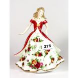 A Royal Albert Country Roses figurine "Figure Of The Year 2008", with box.