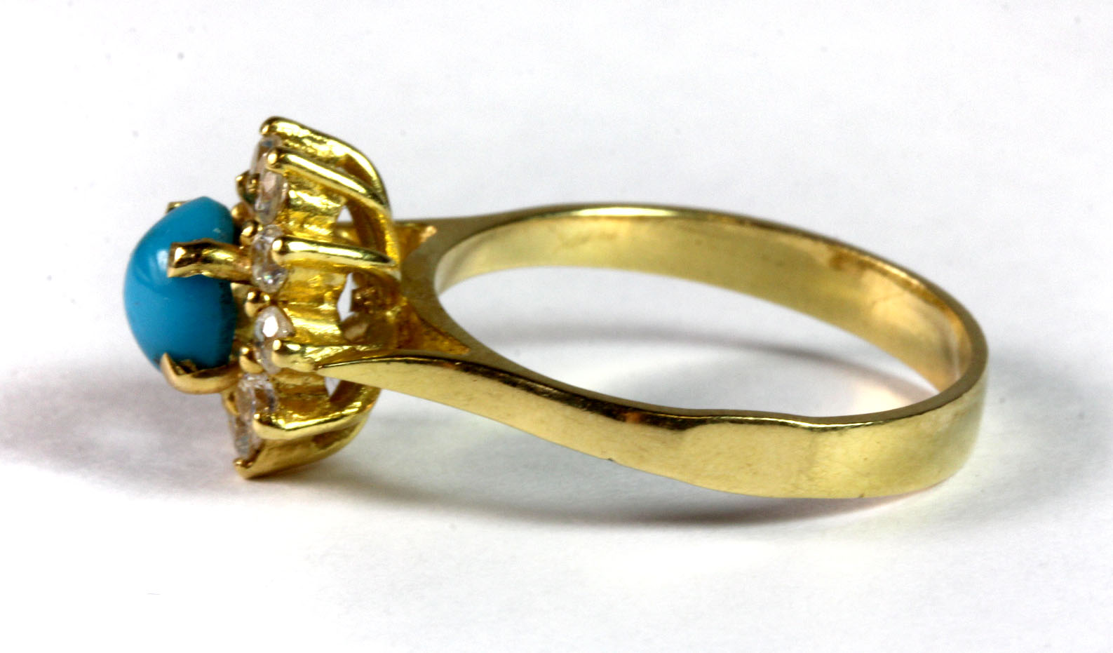 A yellow metal (tested 18ct gold and with an arabic hallmark) stone set cluster ring (P). - Image 2 of 2