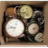 A collection of vintage alarm clocks.