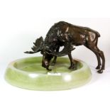 A superb early 20th century Austrian bronze figure of a moose drinking from a large polished onyx