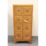 A Chinese style contemporary hardwood eight drawer cabinet, 42 x 38 x 91cm.