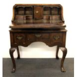 A Queen Anne style walnut veneered bureau, W. 78cm, H. 93cm.