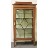 An Edwardian inlaid display cabinet, 59 x 31 x 106cm.