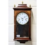 An inlaid mahogany wall clock by Comitti of London, H. 53cm.