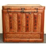 A mid 20th century Chinese bamboo and reed basket, the front decorated with Chinese characters, 50 x