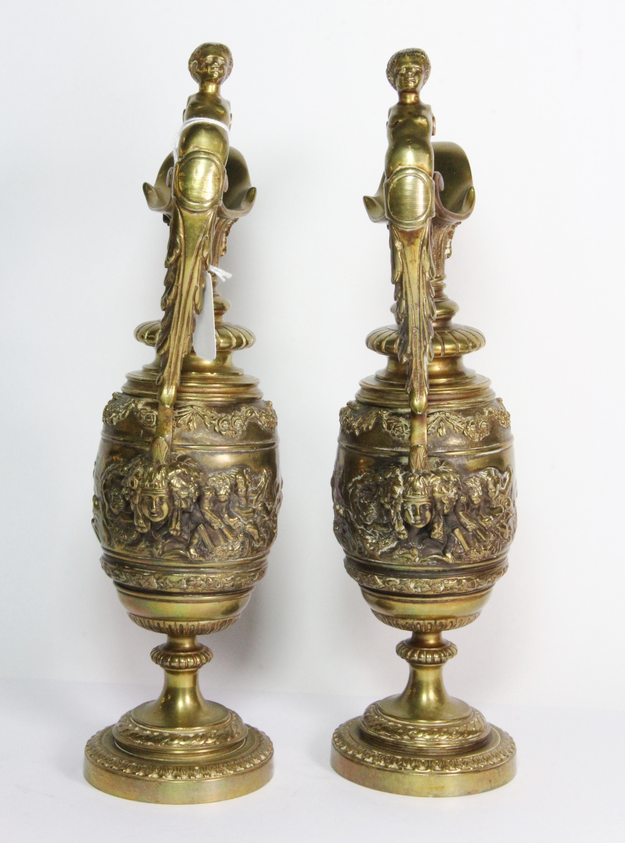 A pair of 19th century French gilt brass ewers, the scroll handle in the form of a semi nude male, - Image 3 of 3