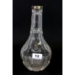 A very fine Regency cut glass bottle / decanter with gilt metal screw thread collar, H. 26cm.