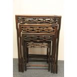 A nest of four Chinese carved hardwood tables, 73 x 37 x 51cm (largest).