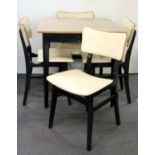 A 1960's kitchen table and four chairs.