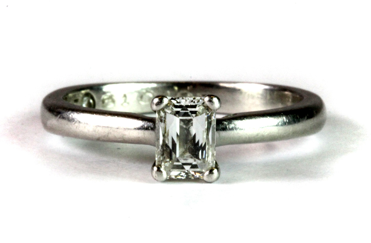 A stunning "The Leo Diamond" platinum engagement ring set with a single modified emerald cut diamond