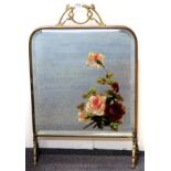 A Victorian hand painted brass and mirrored fire screen, H. 77cm.