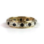 A 9ct yellow gold sapphire and diamond set full eternity ring (N).