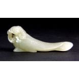 A finely carved early 20th century jadeite jade figure of a mythical bird, L. 6cm.