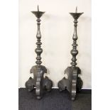 An impressive pair of large 17th / 18th century pewter candlesticks, H. 91cm. Est. £500 - 800.