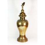 A mid 20th century brass table lamp decorated with Chinese style characters, H. 55cm.