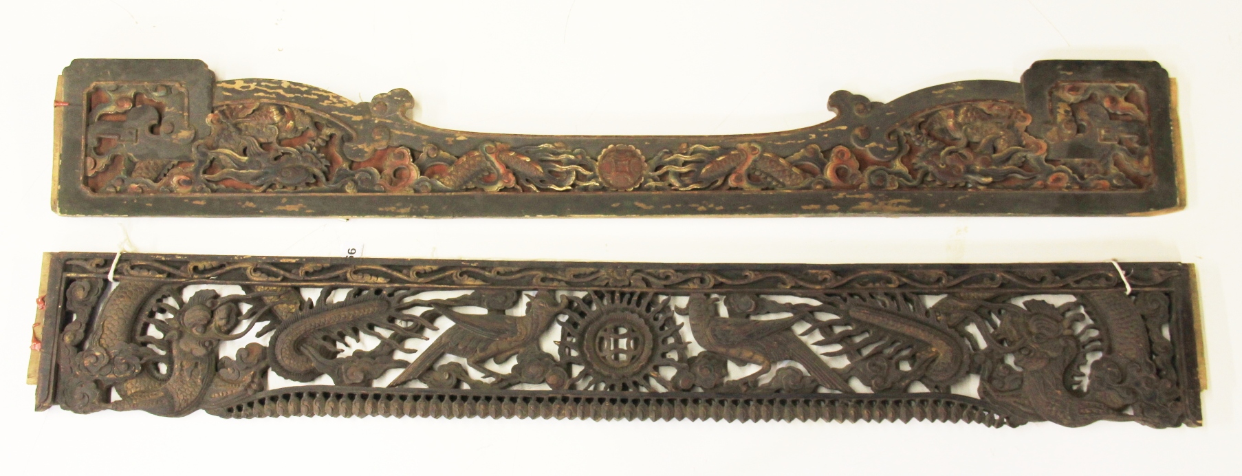 Two 19th century Chinese carved wooden frieze panels, L. 120cm.