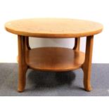 A 1970's oak coffee table, Dia. 86cm, H. 50cm.