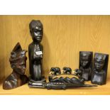 Six carved hardwood tribal and other items.