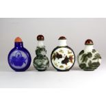 Four Chinese carved Peking cameo glass snuff bottles, Prov. The late Bob Marion collection.