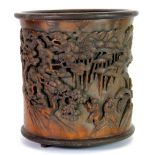 A Chinese ornately carved bamboo brush pot, H. 18cm.