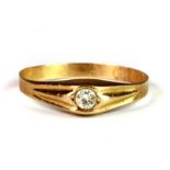 A yellow metal (tested minimum 18ct gold) diamond set ring (N.5).