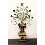 A 19th century French painted wood and metal twin candleholder, in the form of an urn with floral