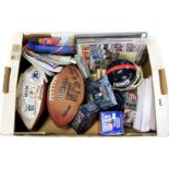 Two signed American footballs and other memorabilia.