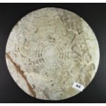 An Archaic form Chinese carved stone disc, Dia. 32cm, restored.